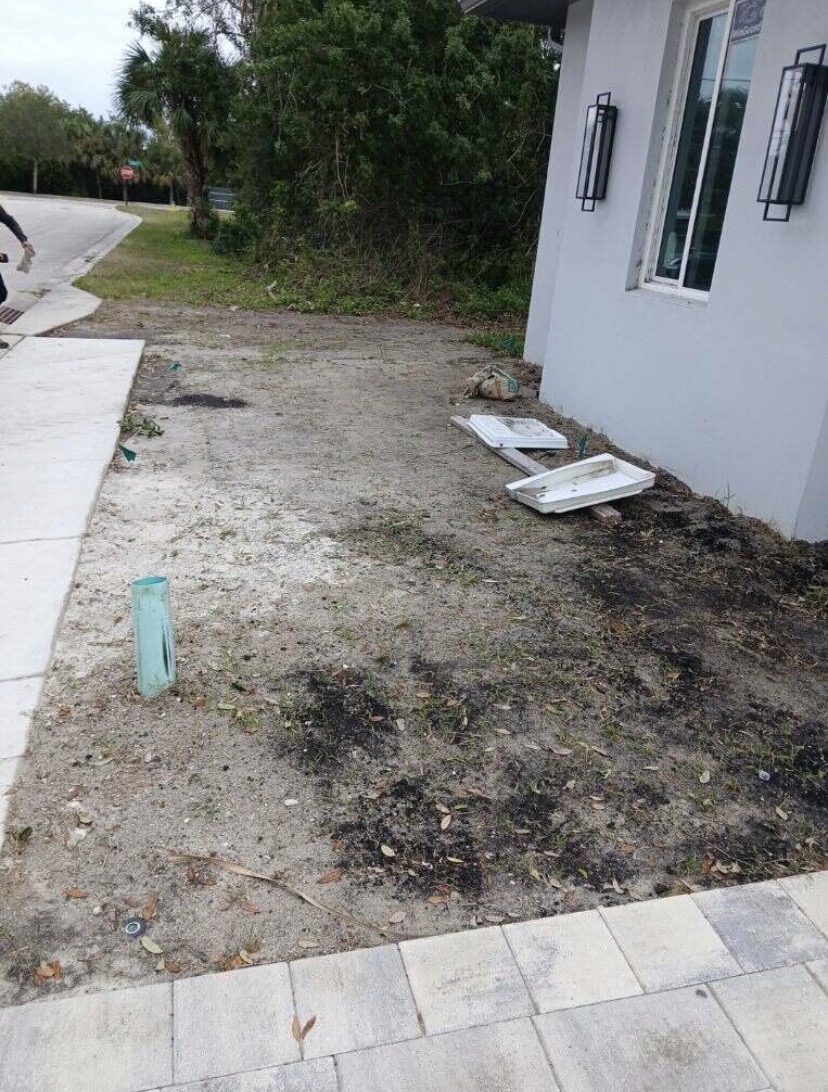 Before: Garden bed in front of a home, before and after landscaping